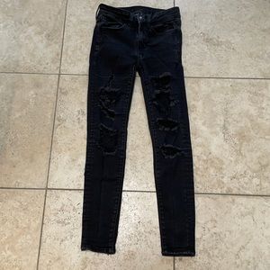 Black stretch ripped jeans. Great condition.